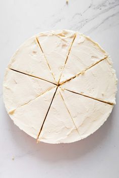 a piece of cake sitting on top of a white plate with four slices cut out