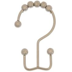 a metal hook with two balls hanging from it's end, on a white background