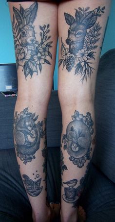 the legs of a woman with tattoos on them