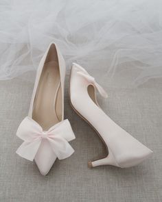 "Pointy toe pump with low heels and added satin bow creates a simple and sweet style for your special occasion. Easy slip on with comfort or bride and wedding party. DETAILS: HEEL HEIGHT: 2.25 inches COLORS AVAILABLE: White, Champagne, Light Blue, Soft Blush, Ivory, Navy, Burgundy UPPER: Synthetic upper and lining MATERIALS: Mandmade outsole Not sure of which size to purchase? Shoes measurements are as follow: (Please note measurements taken the length of inside of shoe from toe to heel) Size 6 Bridesmaids Shoes, Bridal Shoes Low Heel, Wedding Shoes Low Heel, Wedding Shoes Bride, Wedding Shoes Heels, Mob Dresses, Bridesmaid Shoes, Bow Heels, Satin Heels