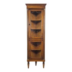 a tall wooden cabinet with two shelves on the front and one door open to reveal its contents