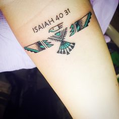 a tattoo on the arm that reads 13 o'ahai and two birds with wings