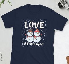 Looking for a fun and unique Christmas gift? Look no further than this snowman couple love t-shirt! This shirt is perfect for anyone who loves spending time with their loved ones during the holiday season. Whether you're giving it as a gift to a friend or yourself, this shirt is sure to be a hit. *Thank you for visiting our shop! *If you'd like to see this design on another product, don't hesitate to reach out. **For other great products, visit our shop @ https://www.etsy.com/shop/InspiremeteesC Snowman Couple, Snowman Shirt, Unique Christmas Gift, Funny Xmas, Unique Christmas Gifts, Christmas T Shirt, Love T Shirt, Cute Christmas, T Shirt Funny