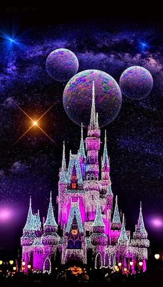 the castle is lit up at night with bubbles floating over it and stars in the sky