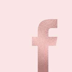 the letter f is made up of pink foil on a light pink background and has a metallic effect