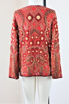 "Stunning ...heavily beaded..with gold and beads throughout...this is soo heavy and oh so beautiful!! Excellent for anytime of year. Are you a red person? This is a great jacket to put against a black dress..or simple outfit..to dress it up and make it formal!! Excellent condition! Measuring: 25\" length Width: 40\" Sleeves: 23\" Pet Free/smoke free Enjoy!" Fall Festive Outerwear With Gold Embroidery, Festive Fall Outerwear With Gold Embroidery, Red Sequined Outerwear For Party, Red Long Sleeve Sequined Outerwear, Embellished Red Outerwear For Fall, Red Embellished Outerwear For Fall, Gold Long Sleeve Outerwear For Festivals, Red Embellished Winter Outerwear, Festive Party Outerwear With Gold Embroidery