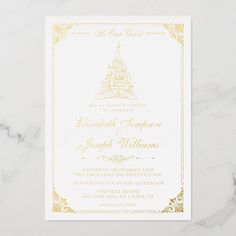 a wedding card with a castle on the front and gold trimmings around it