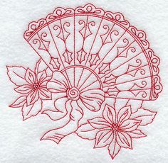 a red doily with flowers on it in the shape of an intricate fan and leaves