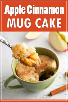 an apple cinnamon mug cake is in a green cup with a spoon full of it