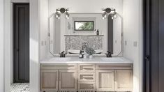 a bathroom with double sinks and mirrors in it's center wall, along with two doors leading to another room