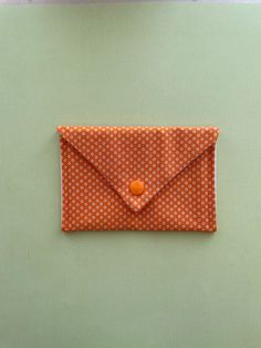 "This is a sweet, little multi-purpose \"wallet\".  It can be used for holding business cards, credit cards, money, lipstick, driver's license, or a few pieces of jewelry for your carry-on.  A great \"gift-within-a-gift\" when used to deliver a gift card...a cute \"envelope\" that can be used when the gift card is just a memory!  Win-Win! This little fabric wallet is perfect to tuck into a backpack, carry-on, diaper bag, purse, fanny pack or even your pocket. Being handmade, each will vary a bit Cell Phone Pocket Clutch Pouch For Gift, Clutch Pouch With Cell Phone Pocket For Gift, Cute Rectangular Card Holder For Daily Use, Cute Rectangular Wallets For Everyday Use, Orange Pouch Wallet For Daily Use, Orange Rectangular Card Holder With Card Slots, Orange Rectangular Card Holder With Slots, Rectangular Zipper Pouch Card Holder For Personal Use, Gift Clutch With Cell Phone Pocket