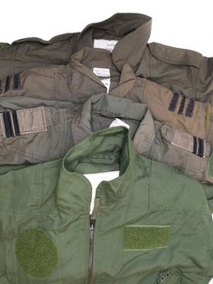 Original Dutch army flight coverall The overall feature a 2-way front opening zip, with zips at the bottom of each leg Velcro adjustable cuffs and Velcro waist adjustment They also have zipped pockets on each chest and hip, as well as a further one at the bottom of each leg Velcro patch for insignia badges on the chest and shoulders MATERIAL MIGHT BE IN FEW DIFFERENT COMPOSITIONS: 93% META-ARAMID, 5% PARA-ARAMID, 2% CARBON FIBER 65% META-ARAMID, 35% VISCOSE FR 50% ARAMID, 48% VISCOSE FR, 2% ANTI Pilot Fighter, Waist Adjustment, Flight Suit, Athletic Build, Mens Overalls, Velcro Patches, Green Olive, British Army, Military Jacket