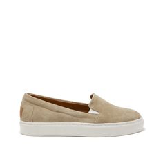 Slip-on contemporary style sneakers for women in taupe suede by Hugs & Co. Ultimately comfortable sneakers with an taupe suede upper and crisp white Vibram sole. Featuring our signature full leather lining for luxurious comfort and long lasting shape. Made in Portugal 100% Suede Upper featuring a 100% Leather Lining Rubber sneaker sole by Vibram Classic Beige Suede Slip-ons, Comfortable Suede Slip-on Slides, Cushioned Slip-on Suede Sneakers, Comfortable Suede Slip-on Sneakers With Textured Sole, Beige Suede Slip-on Sneakers, Women Slip On Sneakers, Rubber Sneakers, Deck Shoes, Comfortable Sneakers