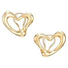 Authentic Tiffany & Co Peretti open heart 18k clip post earrings. 18k Yellow Gold 17.5 grams Earrings stamped: Tiffany & Co 18k Peretti Width: .85 inch or 21.75mm Top to bottom: 18.16mm or .71 inch Depth: 4.36mm Tiffany Elsa Peretti, Heart Clip, Elsa Peretti, Open Heart, Ear Jewelry, Tiffany & Co., Post Earrings, Heart Ring, Fine Jewelry