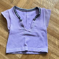 I Originally Bought This Top As A Going Out Top But I Have Never Gotten The Chance To Wear It Out Yet. I Only Tried It On Once. The Fit And Cut Is Everything And The Fabric Is Butter Smooth. Urban Outfitters Seamless V-neck Top, Urban Outfitters Cotton V-neck Tank Top, Purple Ribbed Tops For Summer, Purple Ribbed Summer Tops, Y2k Seamless Summer Tops, Summer Ribbed Purple Tops, Sporty Fitted Top By Urban Outfitters, Summer Purple Ribbed Tops, Casual Seamless Purple Tops