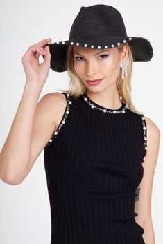 Add a touch of luxury and playfulness to your wardrobe with our Black Pearl Hat! Made from black straw, this hat features a unique and stylish embellishment of ivory pearls around the rim. Perfect for any occasion, this hat will make you stand out in the most fashionable way. Chic Fedora Party Hat, Evening Fedora Straw Hat, Trendy Mini Hats For Summer Party, Chic Boater Hat, Chic Curved Brim Fedora For Parties, Chic Straw Hat For Spring Party, Chic Spring Party Straw Hat, Trendy Fedora Sun Hat For Party, Trendy Party Fedora Sun Hat