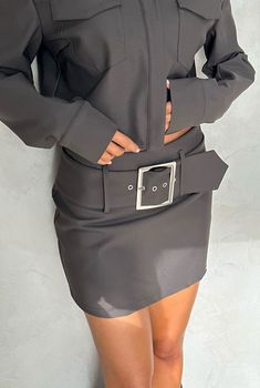 The Lloyd Skirt by Nakedvice is a mid rise mini skirt. Featuring a removable belt with silver buckle, The Lloyd Skirt is the perfect mid-rise mini skirt. Pair with The Lloyd Jacket for a matching set.

Jessica is 171cm and wears a size S. 
 Size: XS, S, M, L, XL, XXL; Colour: MOSS Belted Fitted Mini Skirt, Fitted Mini Skirt With Belt Loops For Fall, Fall Mini Skirt With Belt Loops, Mini Skirt With Belt Loops For Workwear, Fall Mini Skort With Belt Loops, Fitted Mini Skirt With Belt For Fall, Fitted Mini Length Bottoms With Belt Loops, Elegant Mini Skirt With Belt For Work, Chic Mini Skirt Bottoms With Belt