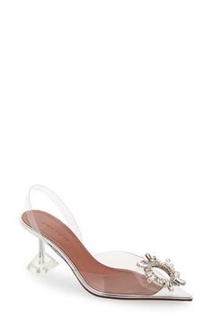 Like something out of a modern fairy tale, this glassy, pointy-toe slingback is glammed up with a bejeweled brooch inspired by an art deco sunburst mirror. The signature flared heel has the look of a stiletto but is more comfortable and stable to walk on. 3" (76mm) heel (size 38.5) Synthetic upper, lining and sole Made in Italy Women's Designer Shoes Luxury Evening Heels With Transparent Straps, Elegant Slingback Pumps With Sculpted Heel For Cocktail, Elegant Sculpted Heel Slingback Pumps For Cocktail, Luxury Heels With Clear Strap For Formal Occasions, Luxury Party Heels With Clear Strap, Glamorous Party Slingback Pumps With Sculpted Heel, Elegant Evening Heels With Clear Strap, Designer Pointed Toe Slingback Pumps For Wedding, Clear Slingback Heels For Formal Occasions