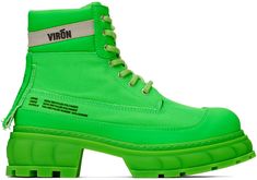 Handcrafted ankle-high PETA-certified recycled canvas boots in green. Water-resistant. · Lace-up closure · Logo printed at padded tongue · Padded collar · Text and logo printed at outer side · Logo embossed at heel counter · Textured rubber midsole · Treaded rubber outsole Supplier color: Neon green