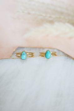 Dainty genuine Turquoise ring with a double band set in 14k gold vermeil over 925 sterling silver. Love it for its minimalistic design but with a pop of color! 14k gold vermeil over 925 sterling silver Natural, Genuine Turquoise Stone Size 9mm x 7mm‍ Nickel Free Hypoallergenic Turquoise Properties Turquoise is known as a purification and renewal stone. It removes negative energy, balances and aligns all of the chakras, stabilizing your mood and instilling calmness. A stone of self realization, s Gold And Turquoise Jewelry, Gold Turquoise Ring, Natural Turquoise Stone, Gold Vermeil Jewelry, Ring Turquoise, Minimalistic Style, Vermeil Jewelry, Turquoise Rings, Solid Gold Jewelry