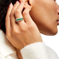 Top off your dressy looks with the bold triple-row design of this oval green emerald and diamond band in 10K gold. Crafted in warm 10K gold 3.0 x 2.0mm oval-shaped verdant-green emeralds glisten along the center. Two rows of diamonds create the sparkling borders. This ring captivates with 5/8 ct. t.w. of diamonds. Emerald And Diamond Band, Emerald Band Ring, Verdant Green, Emerald Band, Gold Book, Green Oval, Emerald Stone, Oval Stone, Green Emerald