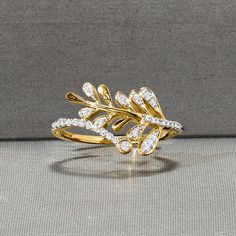 Ross-Simons - .20ct t. w. Diamond Leaf Bypass Ring in 18kt Gold Over Sterling. Size 7. Celebrate the season change with this sparkly ring! Adorned by .20 ct. t. w. round and round brilliant-cut diamonds, the bypass design breaks off into a contemporary branch of leaves. Set in 18kt yellow gold over sterling silver. 1/2" wide. Diamond leaf bypass ring. Diamond birthstones are the perfect gift for April birthdays. Sparkling Diamond Rings In Yellow Gold, Sparkling Yellow Gold Diamond Ring, Diamond Rings In Yellow Gold With Sparkling Details, Yellow Gold Diamond Rings With Sparkling Details, Elegant Yellow Gold Sparkling Diamond Ring, Sparkling Yellow Gold Cubic Zirconia Diamond Ring, Fine Yellow Gold Sparkling Rings, Sparkling 14k Yellow Gold Ring, Yellow Gold Diamond Bypass Ring