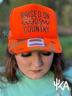 Step back in time with the ultimate throwback—our 'Raised on 90s Country' foam mesh trucker hat by Kactus Avenue! This hat is perfect for any 90s country music fan looking to showcase their roots. Made with lightweight foam and breathable mesh, it combines comfort with a classic retro vibe. Ideal for sunny days, music festivals, or casual wear. Tap into your 90s nostalgia and express your love for country classics with this stylish cap. #90sCountry #TruckerHat #VintageStyle #KactusAvenue #MusicLovers Trendy Snapback Hat For Country Events, Trendy Hats For Country Concerts In Summer, Trendy Hats For Summer Country Concerts, Trendy Summer Hats For Country Concerts, Country Style Baseball Cap, Country Style Snapback Hat For Summer, Country Style Summer Snapback Hat, Country Style Snapback Hat, Casual Summer Hats For Country Concerts