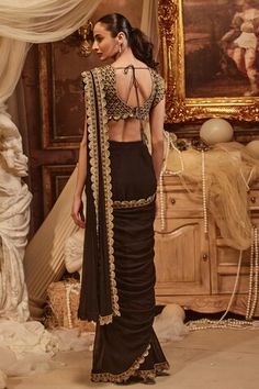 Black pre-draped saree with zardozi, sequin embroidered scallop border. Paired with floral embroidered padded blouse. - Aza Fashions Elegant Pre-draped Saree For Festivals, Elegant Draped Dupatta For Festivals, Traditional Fitted Dupatta With Draped Sleeves, Draped Blouse Piece For Evening Festivals, Traditional Draped Evening Choli, Elegant Draped Blouse For Festivals, Traditional Fitted Lehenga With Draped Sleeves, Festival Evening Pre-draped Saree, Draped Blouse Piece For Festivals