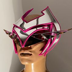 80s inspired futuristic Cyber goggles ,eyewear, glasses,sci fi, futuristic eye wear,head mask great for burning man or any rave festival for men and women . Made out of rigid mirror pvc, clean retro futuristic lines. These futuristic goggles are perfect for any performer. This eyewear has a pink see through visor from the inside out. These goggles are fuxia lined on the inside . Made out of lightweight chrome mirror pvc. Comfortable adjustable clear band on Adjustable Eye Mask For Festival, Adjustable Eye Mask For Festivals, Futuristic Halloween Masks And Prosthetics, Futuristic Adjustable Masks And Prosthetics For Cosplay, Futuristic Adjustable Masks For Masquerade, Futuristic Adjustable Masquerade Masks And Prosthetics, Adjustable Rave Masquerade Masks And Prosthetics, Adjustable Rave Masks For Masquerade, Adjustable Rave Masks And Prosthetics For Masquerade