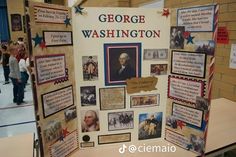 a bulletin board with pictures and information about george washington is displayed in a school hallway