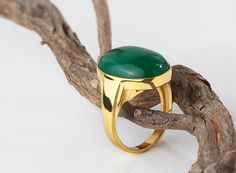 Metal: 10k Yellow Gold Agate: 1.3cm x 1.8cm (0.5" x 0.7") shape - oval cabochon setting type - Bezel setting Product weight: 5.0 gr This gorgeous and versatile ring boasts spectacular accent - the stone for sparkling combination! Crafted from 10k yellow gold, an attention grabbing oval green agate sitting at the center. The right ring, that can speak volumes about your personal taste and aesthetic. ----------------------------------------------------------------------AgateAgate derives its name Mens Ring Designs, Yellow Gold Mens Rings, Rings Men, Cabochon Ring, Wear Green, Oval Rings, Personal Taste, Red Agate, Green Agate