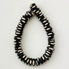 Item: Bone beads Size: 11x3mm rondelles Quantity: 10 loose beads Black and white bone beads, 11x3mm rondelles, pack of 10 loose beads. The beads have a rustic look and would be great in ethnic or tribal style jewelry. You will receive 10 beads from the same strand as the ones pictured, quantity 10 loose beads. All items will be wrapped in bubble wrap for extra protection. Items will be shipped in a padded bubble mailer or small box. Items ship next day, except on Sundays and holidays. Shop home page: https://www.etsy.com/shop/PTDestashTreasures Beads Black And White, Bone Beads, Bubble Mailer, Mala Beads, Beads Jewelry, Small Boxes, Style Jewelry, Jewelry Making Supplies, Loose Beads