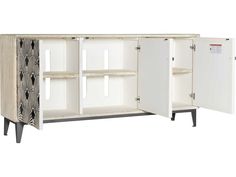 a white cabinet with two doors and three shelves on one side, an open door to the other