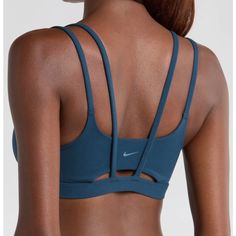 Nwot Ships Same Day! Color: Armory Navy/ White Low-Impact Support; Ideal For Studio And Yoga. Signature Dri-Fit Tech Keeps You Dry And Comfortable In This Strappy Sports Bra With A Foam Pad Insert For Extra Coverage. Elasticized Straps Dri-Fit Moisture-Wicking Technology Lined 63% Nylon, 37% Spandex Machine Wash, Line Dry Imported Item #107641 Sporty Nike Activewear, Nike Yoga Top With Built-in Bra, Athleisure Top With Built-in Bra For Sports, Blue Nike Sports Bra For Training, Nike Blue Sports Bra With Moisture-wicking, Nike Sports Bra For Yoga, Nike Blue Sports Bra For Training, Blue Athleisure Sports Bra For Loungewear, Nike Blue Moisture-wicking Sports Bra