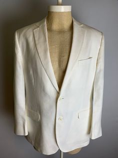 Classic Brooks Brothers Summer Irish Linen Sports Coat Blazer size 44R Baird McNutt Irish Linen Made in Thailand  2- button  Fully Lined  Center Vent Flap pockets  100% cotton  Great condition. 23-1/2" across the chest  19" shoulder to shoulder  26" shoulder to cuff  35" from top of collar fold to hem Classic Linen Suits With Buttons, Spring Formal Sport Coat With Flat Front, Classic Spring Suits With Button Closure, Classic Tailored Spring Sport Coat, Classic Spring Sport Coat With Buttons, Classic Sport Coat With Buttons For Spring, White Linen Sport Coat With Notch Lapel, Classic White Suit With Button Closure, Classic White Suits With Button Closure