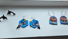 Orca handmade and hand painted stud earrings. Orca breaching in the sun hand painted and handmade earrings Sunset Bronze Whale Tale Hoop Handmade and hand painted clay earrings Also select 2 or 3 styles and save more money the more you purchase.  Please select one from the numbers listed in photo 2. You can also select 2 or 3 pairs and save money with each selection. If you choose 2 or 3 pairs please be sure to include personalization specifying which numbers you would like. Hand Painted Clay Earrings As Gift, Hand Painted Clay Earrings For Gift, Hand Painted Clay Earrings For Everyday Wear, Hand Painted Artsy Earrings For Everyday, Artsy Hand Painted Earrings For Everyday, Unique Hand Painted Everyday Earrings, Artsy Hand Painted Everyday Earrings, Unique Hand Painted Earrings For Everyday, Everyday Hand Painted Artsy Earrings