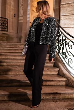 This Black Sequined Open Front Cropped Jacket is the perfect addition to your wardrobe. With its elegant design and stunning sequin detailing, it adds a touch of glamour to any outfit. The open front style is effortlessly chic, while the cropped length makes it versatile for both formal and casual occasions. Elevate your look with this must-have jacket. Size Chart (CM) Sizes Bust Hem_Width Shoulder Sleeve_Length Length Relax Relax Relax Relax Relax S 105 102 36 61.5 49.4 M 111 108 37.5 62.5 51 L Blazer Sequin Outfit, Black Sequin Jacket Outfit, Sequin Jacket Outfit, Black Sequin Jacket, Denim Short Jumpsuit, Golden Fleece, Parisian Women, Sleek Dress, Collarless Jacket