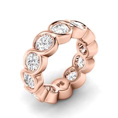 a rose gold ring with diamonds on it