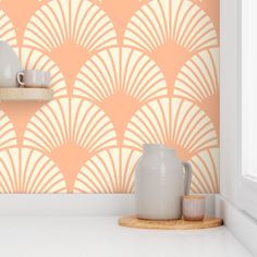 an orange and white art deco wallpaper with vases on the shelf next to it