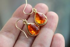 Burnt Orange Earrings Amber Gold Jewelry - Tangerine Bridesmaid Earrings Wedding Earrings Amber Bridesmaid Jewelry Orange Wedding Jewelry The burnt orange teardrop measures overall 19mm by 12mm (including the loop). The glass in the middle of the teardrop measures 13mm by 10mm by 6mm. The earwires are 14k gold filled. Also in silver: https://www.etsy.com/listing/195437184/silver-burnt-orange-earrings-amber The length of the earrings is a little over 1 inch. These earrings are simply stunning! Yo Orange Jewelry Set, Tangerine Wedding, Orange Bridesmaid, Orange Jewelry, Wedding Bridesmaid Jewelry, Orange Earrings, Jewelry Bridesmaid, Earrings Bridesmaid, Orange Wedding