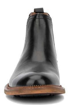 Elastic insets bring essential flexibility to a polished leather Chelsea boot set on a stacked sole. 4" shaft height, 12" opening circumference Pull-on style Comfort cushioned insole Stacked sole Leather and textile upper, rubber sole Imported Black Leather Boots With Leather Backing, Formal Boots With Leather Backing And Round Toe, Black Chelsea Boots With Snip Toe And Leather Lining, Black Chelsea Boots With Leather Lining And Snip Toe, Black Moc Toe Boots With Lug Sole, Classic Boots With Leather Backing And Round Toe, Classic Boots With Leather Backing, Black Chelsea Boots With Lug Sole For Formal Occasions, Black Chelsea Boots With Moc Toe And Leather Lining