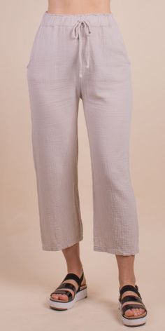 Lightweight and Breathable Waffle Cotton Pants. Features an Elastic Faux Tie Waist and Pockets. Make it a Set with the Jesi Cotton Top. 100% Cotton Made in Italy One Size Model 5'7" Chic Cropped Leg Pull-on Pants, Solid Color Cropped Leg Pull-on Pants, Solid Ankle-length Pants For Daywear, Chic Cropped Leg Loungewear Pants, Chic Cropped Leg Lounge Pants, Chic Beige Cropped Leg Bottoms, Beige Relaxed Fit Cropped Pants, Beige Straight Leg Bottoms For Daywear, Beige Straight Pants With Pull-on Style