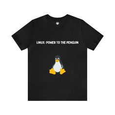 It is the perfect gift for a Linux enthusiast. This classic unisex jersey short-sleeve tee fits like a well-loved favorite. Soft cotton and quality print make users fall in love with it repeatedly. These t-shirts have ribbed knit collars to bolster shaping. The shoulders are tapered for a better fit over time. Dual side seams hold the garment's shape for longer.  . It is made with 100% Airlume combed and ring-spun cotton, a lightweight fabric (4.2 oz/yd² (142 g/m that is easy to layer and breath Graphic Tee Crew Neck T-shirt As Gift, Funny Short Sleeve Tops With Logo Print, Black Tri-blend T-shirt With Funny Text, Funny Black Short Sleeve T-shirt, Black Relaxed Fit T-shirt As Gift, Unisex Cotton T-shirt For Gift, Unisex Graphic Print T-shirt For Gift, Gift Black T-shirt With Funny Text, Graphic Tee T-shirt With Relaxed Fit As Gift