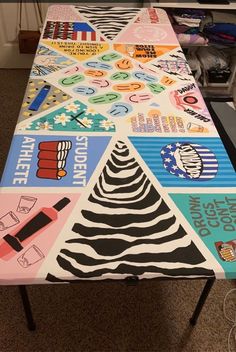 a colorful table with many stickers on it