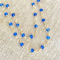 Tiny beads necklace rosary style with either blue chalcedony or sapphire. Length Blue Chalcedony 18" Length Sapphire 19" Blue Sapphire crystals have an excellent energy within the throat chakra to aid your communication ability. Blue chalcedony energies mainly focus on your throat and enables you to speak freely. -This information is intended for spiritual support only Chalcedony beads 3mm Sapphire 3-3.5mm Wire & Findings 14K GF Tiny Beads, Gem Necklace, Charm Rings, Throat Chakra, Blue Chalcedony, Beads Necklace, To Speak, Pearl Ring, Rosary