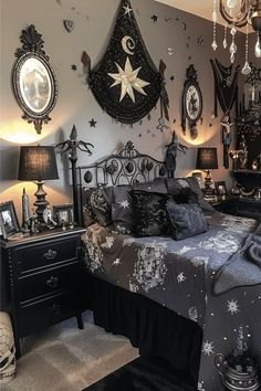 a bed room with a neatly made bed and chandelier