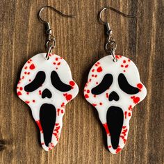 These unique Bloody Ghost Killer horror earrings are lightweight and perfect if you love to stand out from the crowd! They add a dark and spooky look to any outfit! They're the perfect little gift for your spooky friend or yourself😉!Approximately 1" x 3" in length (including hook)All Jewelry is made with skin-friendly metal alloy hooks (nickel-free & lead-free!) Spooky Red Halloween Jewelry, Red Novelty Jewelry For Halloween, Red Pierced Halloween Earrings, Spooky Handmade Earrings For Halloween, Spooky Handmade Halloween Earrings, Handmade Spooky Halloween Earrings, Gothic Halloween Earrings Gift, Red Pierced Earrings For Halloween, Fun Black Halloween Jewelry