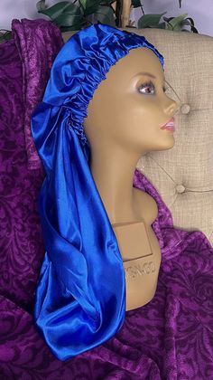 This Queenz Den Single Layer Braid Long Hair Silky Satin Bonnet is the perfect addition to your night time routine. Made with high-quality satin, this bonnet will keep your hair silky and smooth while protecting it from breakage and damage.  Featuring a button closure, this bonnet is easy to wear and stays securely in place throughout the night. The single layer design ensures that it's lightweight and comfortable, so you won't even notice you're wearing it. Use this bonnet to keep your hair looking its best while you sleep, or wear it during the day as a stylish accessory. Its design adds a touch of elegance that's perfect for any occasion. Invest in your hair with this luxurious satin bonnet from A Queenz Den - your tresses will thank you! Satin Bonnet, Hair Bonnet, Night Time Routine, Braids For Long Hair, Silky Hair, Layers Design, Hair Accessories Headbands, Stylish Accessories, Hair Looks