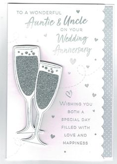 a card with two champagne glasses and hearts on the front, says to a wonderful annte & uncle on your wedding anniversary