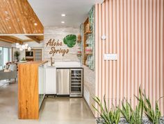 the kitchen is clean and ready to be used as a wine cellar for entertaining guests